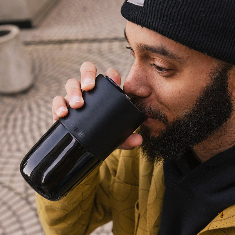 16oz-rise-tumbler-w6 16oz_rise_tumbler_black_man_drink_square.jpg
