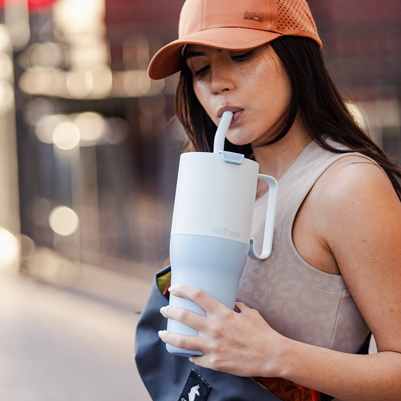 36oz-rise-tumbler-with-straw-lid-s5 36oz_rise_tumbler_straw_girl_sip_square.jpg