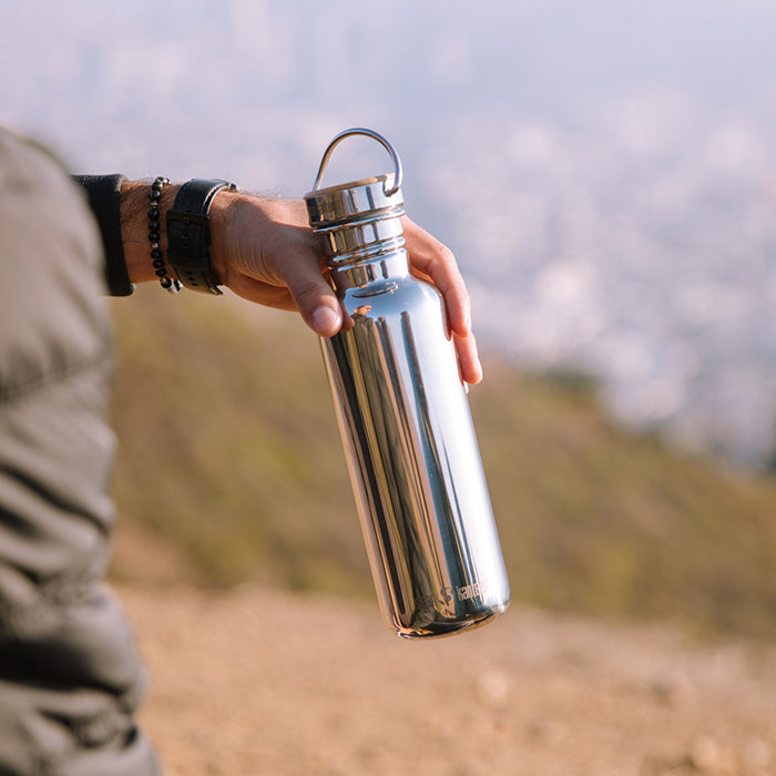 27oz-reflect-with-bamboo-cap-o5 K27SSLRF-MS-BAMBOO_reflect_bottle_hand_lifestyle.jpg
