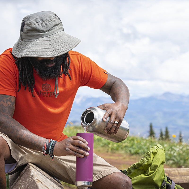 64oz-tkwide-with-loop-cap-a8 tkwide_64oz_bottle_backpacker_mountains_filling_square.jpg
