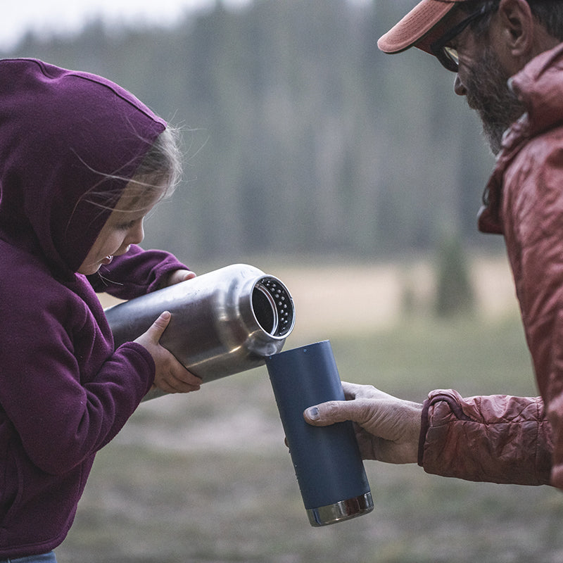 64oz-tkwide-with-loop-cap-a8 tkwide_64oz_bottle_girl_dad_filling_square.jpg